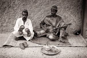 Traditional Gnaoua musicians performing in Morocco, representing the authentic cultural experiences available on customized tours